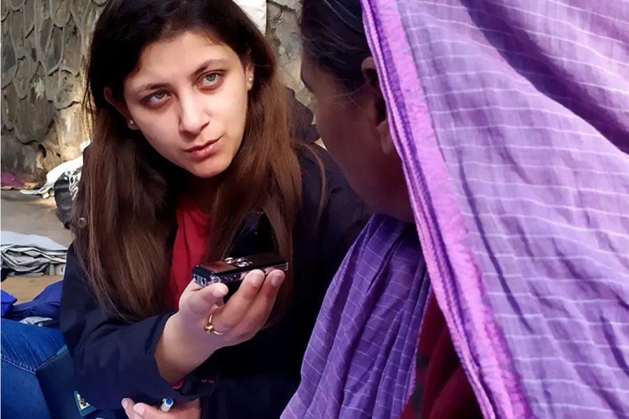 The author interviews vendors in the mahila bazaar in Delhi. 