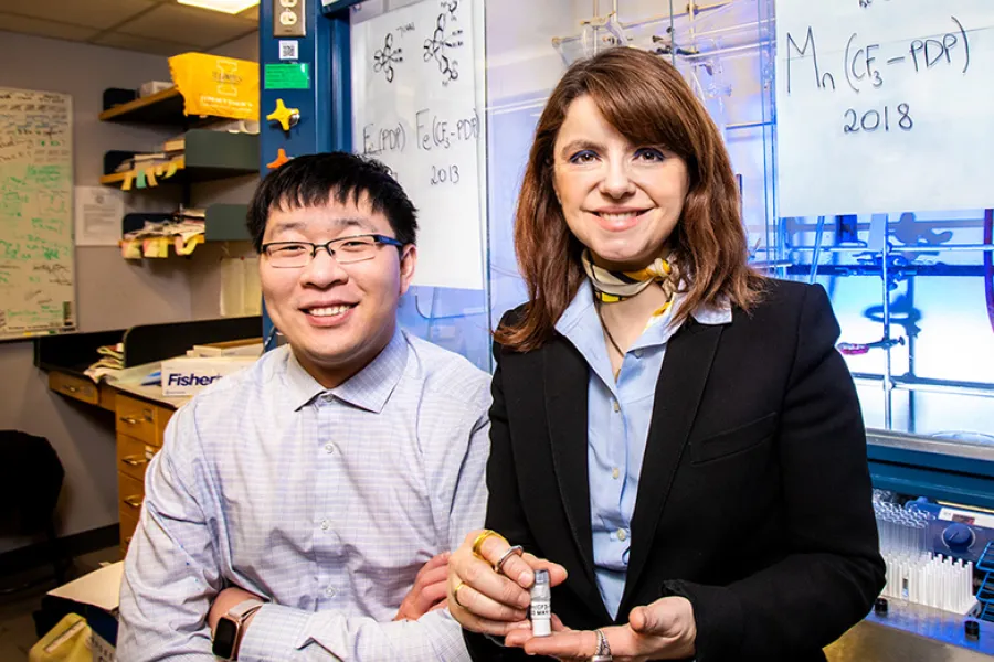 Chemistry professor M. Christina White, right, and graduate student Jinpeng Zhao developed a new catalyst that has the potential to advance the pace and efficiency of drug development. 