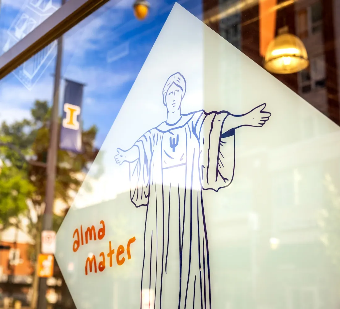 Alma Mater drawing on front windows of Graduate College