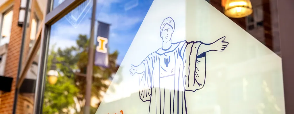 Alma Mater drawing on front windows of Graduate College