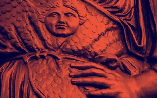 Statue with hand on hip. 
