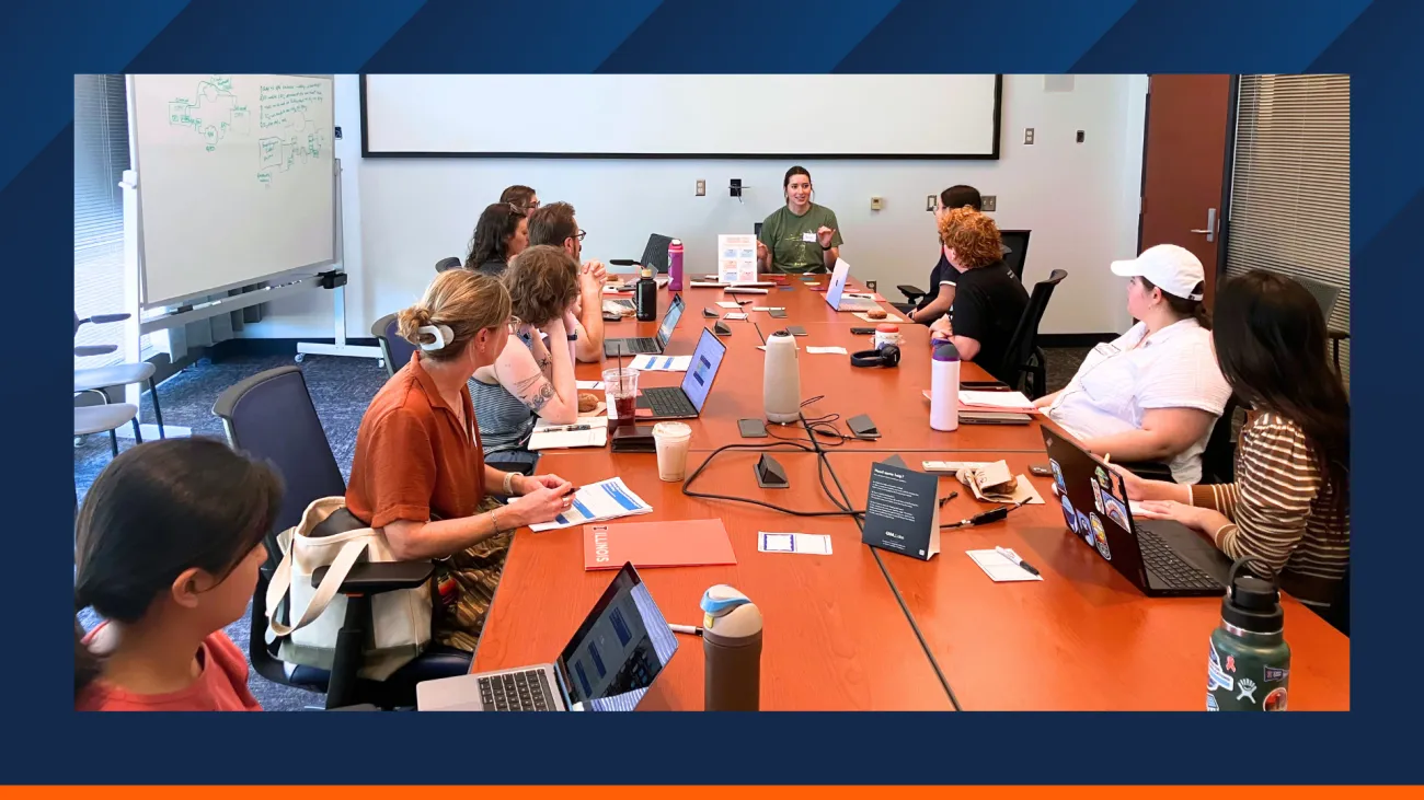 Graduate students engaging with the workshop