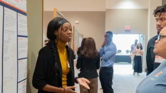 Participant explaining research