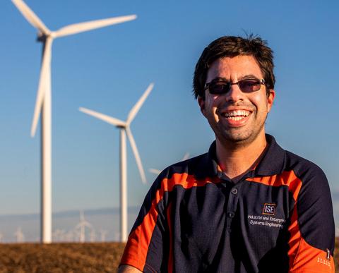 Graduate student Lucas Buccafusca looks for ways to improve the efficiency of wind farms. He had a key insight on a foggy day near a wind farm in central Illinois.