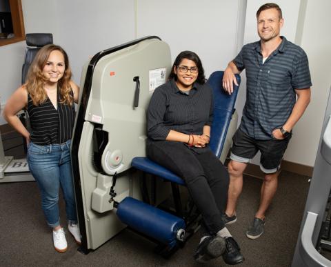 A team including, from left, doctoral student Colleen McKenna, undergraduate student Elizabeth Poozhikunnel and  kinesiology and community health professor Nicholas Burd found that post-workout muscle building and repair is blunted in adults with obesity.